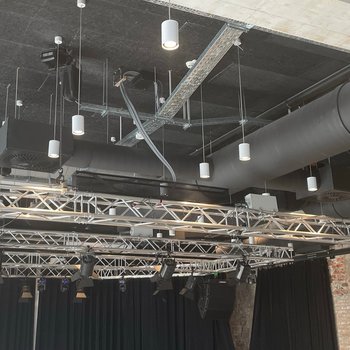 GIS motors hold a stage system for light installations and theatre curtains